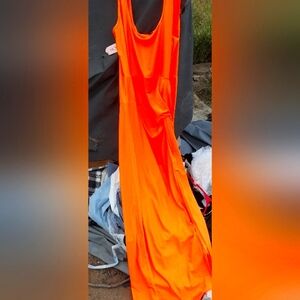 Mica brand orange dress.  Long, sleeveless, bright orange, stretchy material.